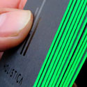 Sleek Neon Green Edge Painted Black Letterpress Business Card